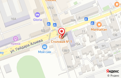 Золотой компас на карте